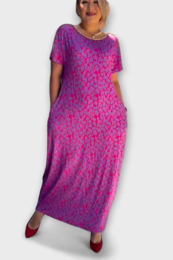 Raven - Chic Lente Maxi Jurk met Zakken en Stijlvolle Print