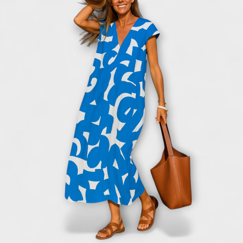 Tirzah - Elegante V-hals Jurk met Geometrische Print