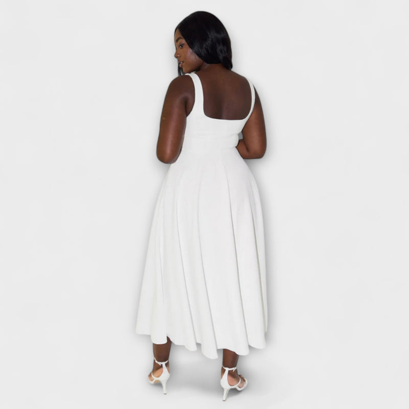 Trinity - Chique Effen Mouwloze A-Lijn Midi Jurk