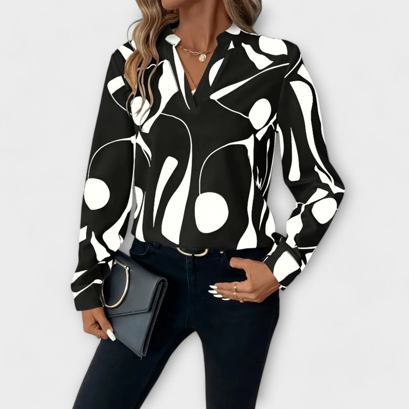 Elegante blouse met lange mouwen en puntige halslijn