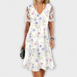 Harlyn - Charmante Midi-jurk met Bloemenkant en Patchworkontwerp