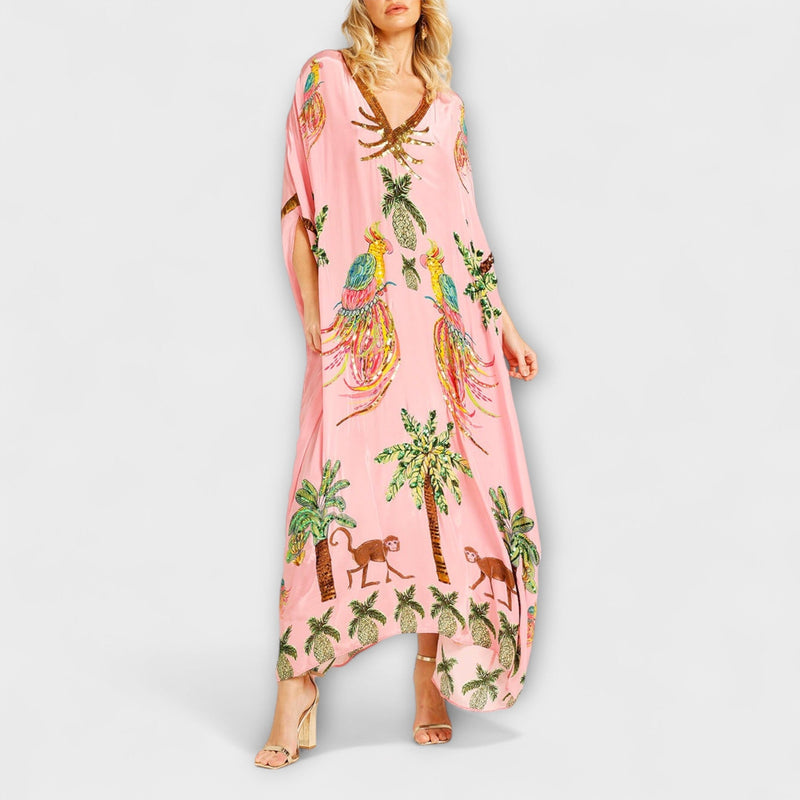 Linda - Opvallende Jurk met Asymmetrische Schouders en Kokosboomprint