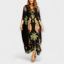 Linda - Opvallende Jurk met Asymmetrische Schouders en Kokosboomprint