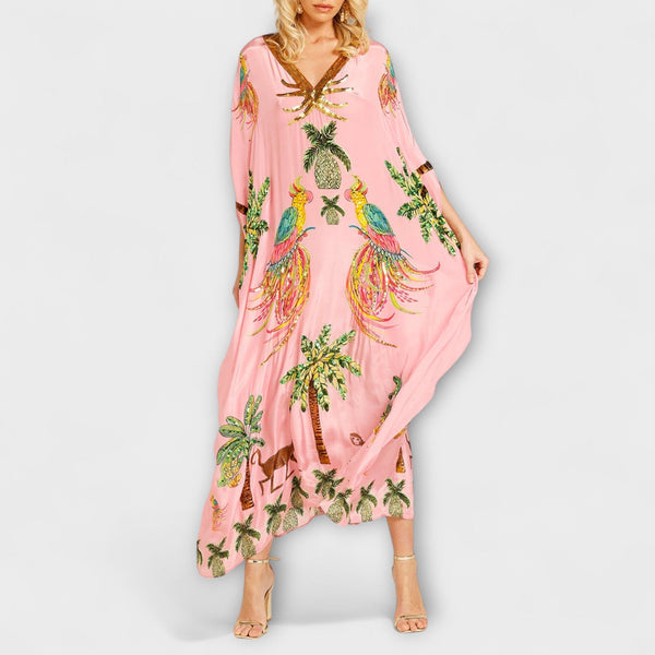 Linda - Opvallende Jurk met Asymmetrische Schouders en Kokosboomprint