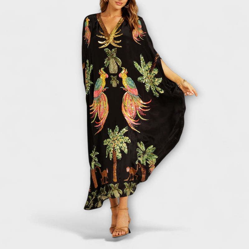 Linda - Opvallende Jurk met Asymmetrische Schouders en Kokosboomprint