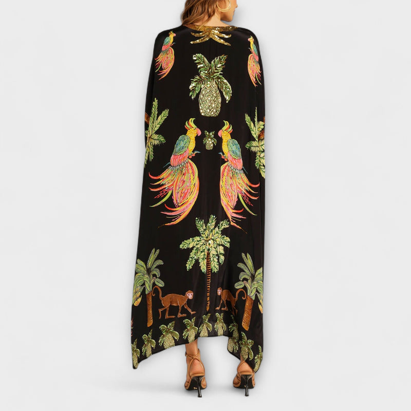 Linda - Opvallende Jurk met Asymmetrische Schouders en Kokosboomprint