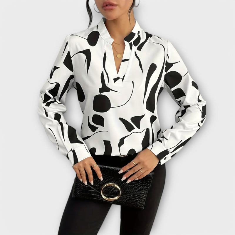 Elegante blouse met lange mouwen en puntige halslijn
