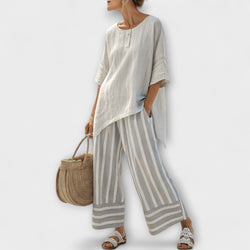 Lucy - Asymmetrische Blouse en Verticaal Gestreepte Broek