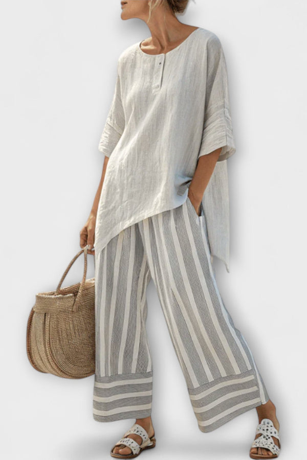 Lucy - Asymmetrische Blouse en Verticaal Gestreepte Broek