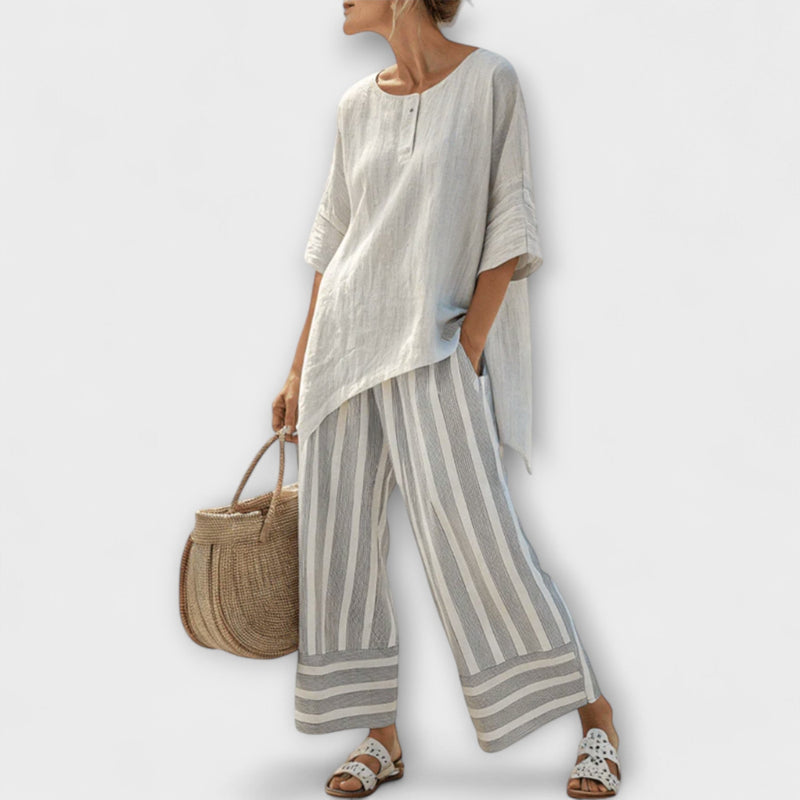 Lucy - Asymmetrische Blouse en Verticaal Gestreepte Broek