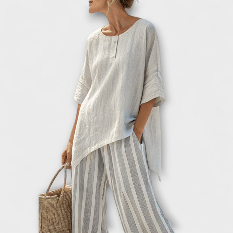 Lucy - Asymmetrische Blouse en Verticaal Gestreepte Broek